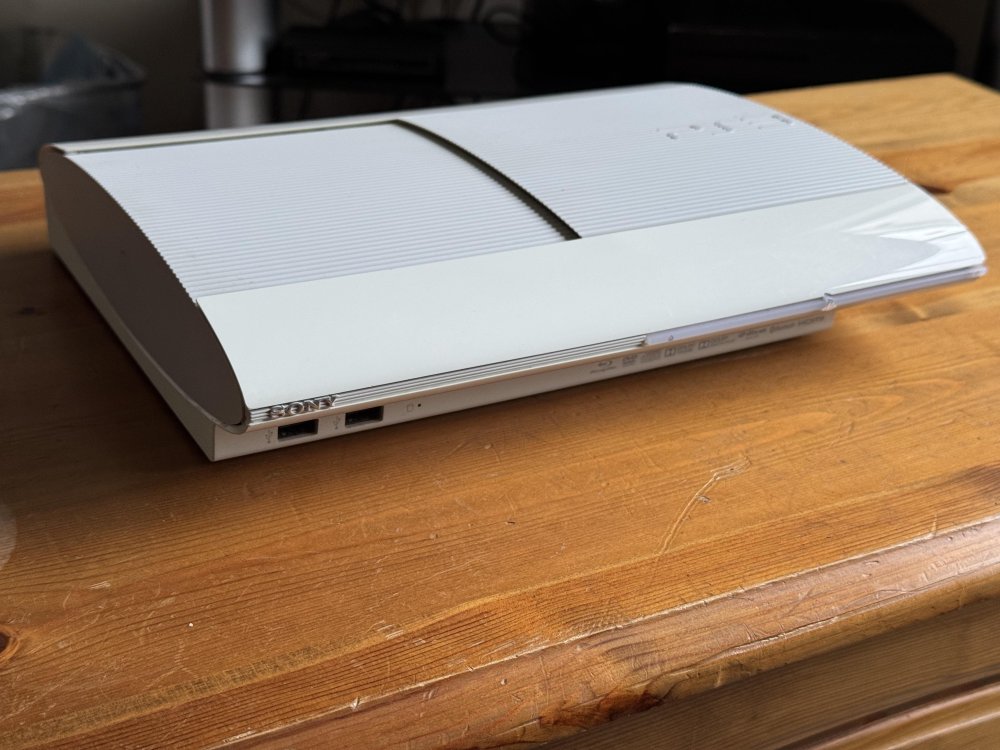 ps3-white-super-slim-v0-i4y3ql3sdbxd1.jpg